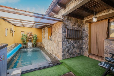 Property building, Living room, Swimming pool
