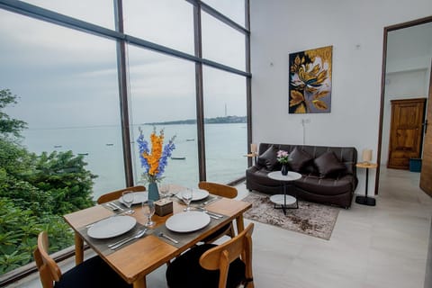 Living room, Seating area, Dining area, Sea view