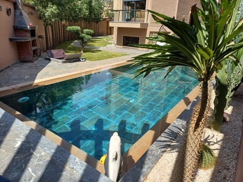Property building, Day, BBQ facilities, Pool view, Swimming pool, sunbed