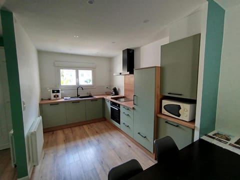 Kitchen or kitchenette, dishwasher, microwave, oven, stove, toaster