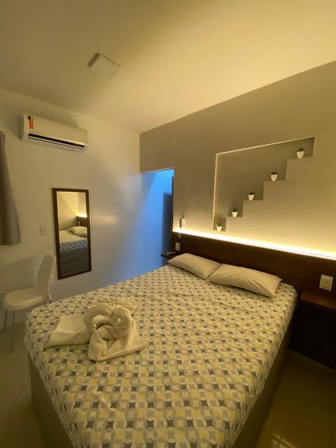 Bed, Bedroom, towels, air conditioner