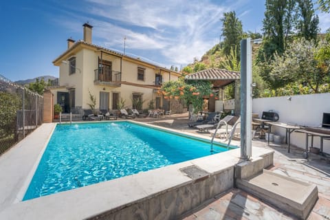 Property building, Living room, Swimming pool