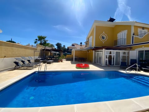 Property building, Living room, Swimming pool