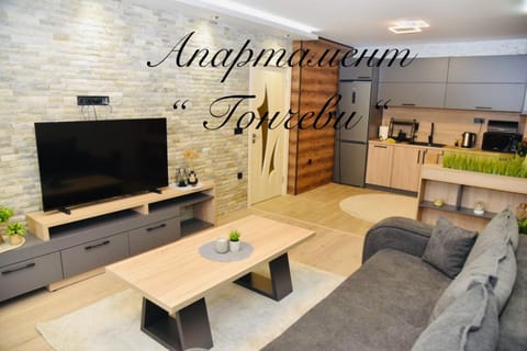 TV and multimedia, Kitchen or kitchenette, Living room, Seating area, Text overlay