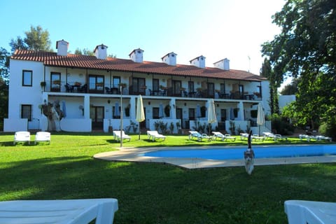 Property building, Facade/entrance, Garden, Pool view, Swimming pool, Swimming pool