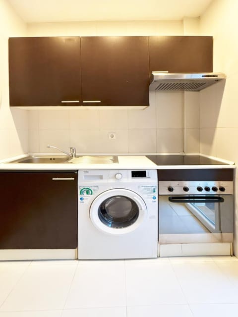 Kitchen or kitchenette, washing machine