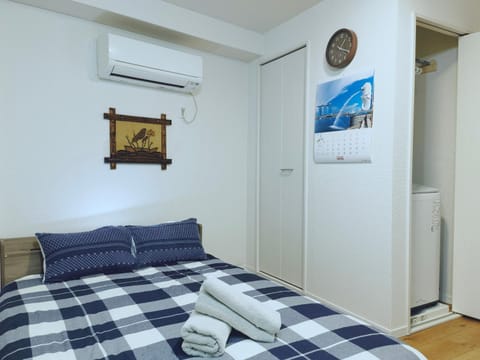 Bed, Bedroom, towels, wardrobe, air conditioner