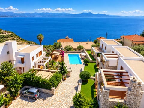 Property building, Patio, Day, Natural landscape, Mountain view, Pool view, Sea view, Swimming pool, sunbed