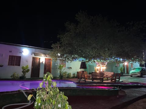 Property building, Patio, Night, Pool view
