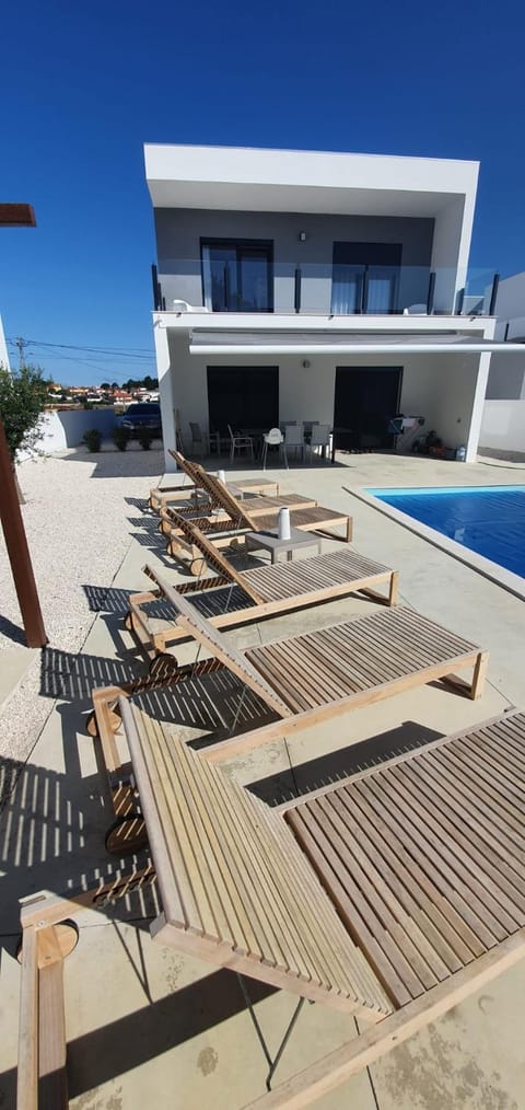 Property building, View (from property/room), Balcony/Terrace, Pool view, Swimming pool, sunbed