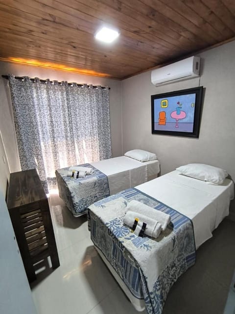 Bed, Photo of the whole room, Bedroom, towels, air conditioner