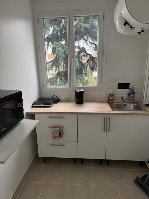 Kitchen or kitchenette, stove