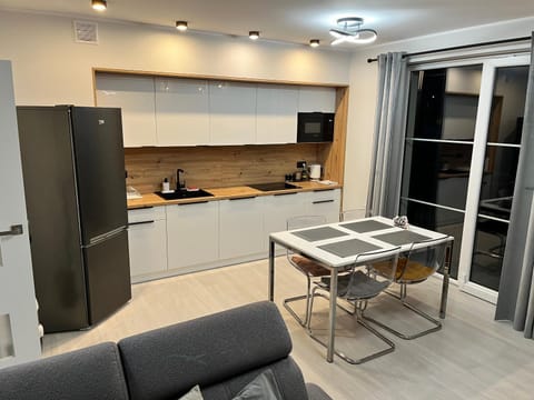 Kitchen or kitchenette, oven, stove