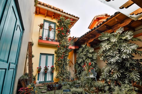 Property building, Patio, Patio, Restaurant/places to eat, Garden, Garden, Bedroom, Garden view, Garden view, Location