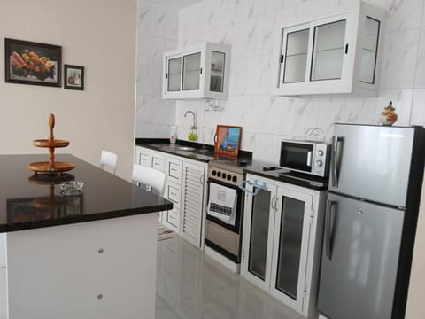 Kitchen or kitchenette, oven, stove, toaster