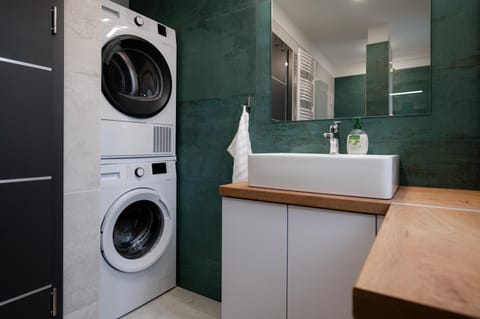 Bathroom, hair dryier, washing machine, dryer