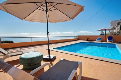 Property building, Living room, Swimming pool