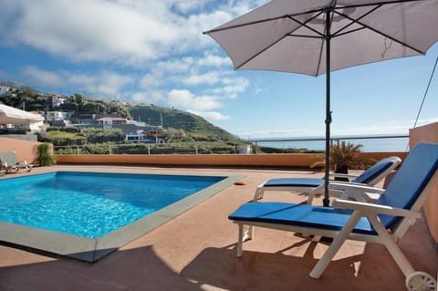 Property building, Living room, Swimming pool