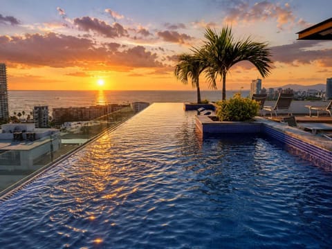 Pool view, Sea view, Swimming pool, Sunset, sunbed