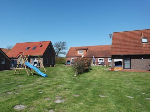 Ferienwohnung Muschel 2 mit gemeinschaftlichen Garten, Bensersiel Apartment in Esens