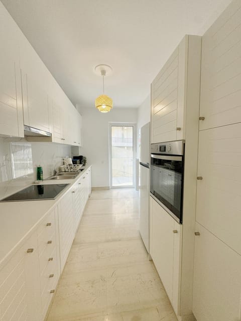 Kitchen or kitchenette, oven, stove