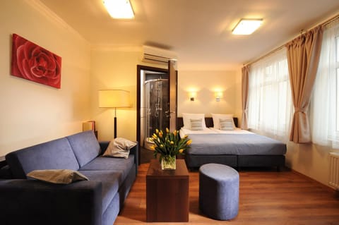 Bed, Living room, Seating area, Bedroom