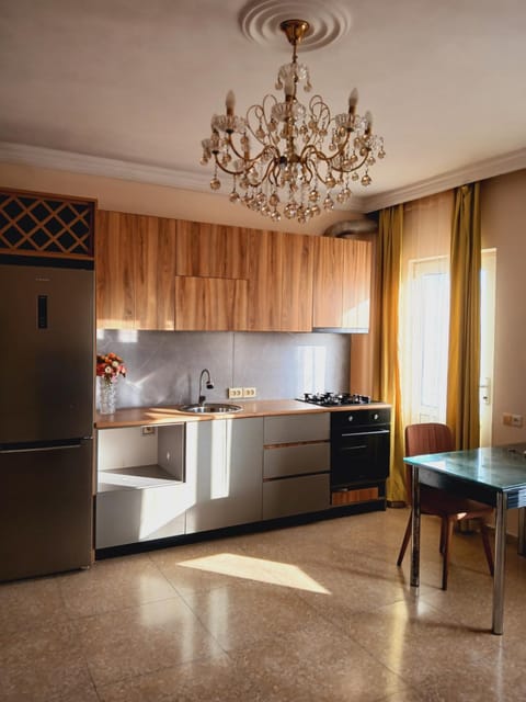 Kitchen or kitchenette, microwave, oven, stove