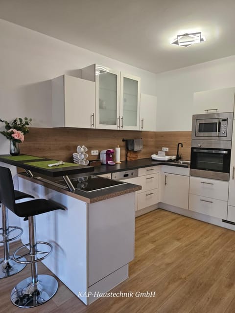 Kitchen or kitchenette, oven