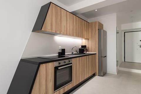 Kitchen or kitchenette, oven, stove