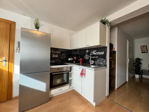 Kitchen or kitchenette, oven, stove