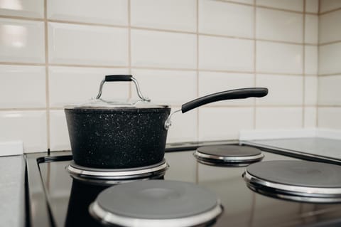 Kitchen or kitchenette, stove