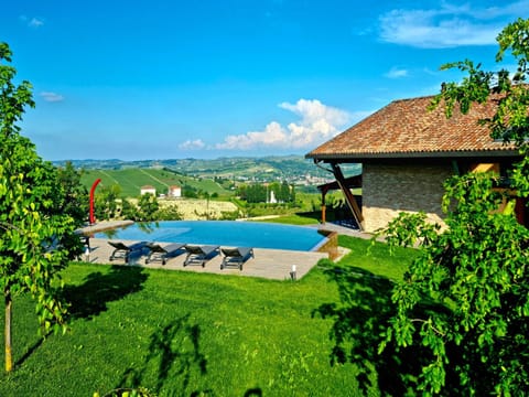 Property building, Natural landscape, Solarium, Garden view, Swimming pool, sunbed