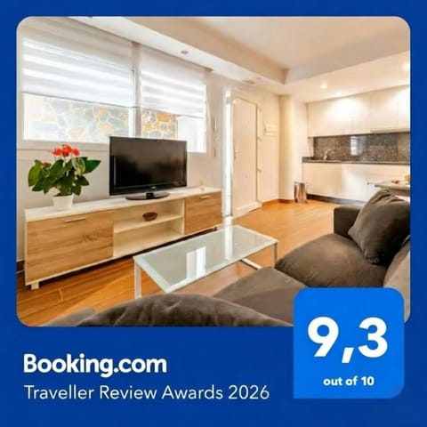 Property logo or sign, TV and multimedia, Living room, Seating area, Logo/Certificate/Sign, Text overlay, Certificate/Award