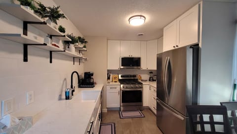 Kitchen or kitchenette, oven