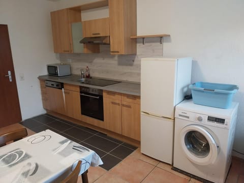 Kitchen or kitchenette, washing machine