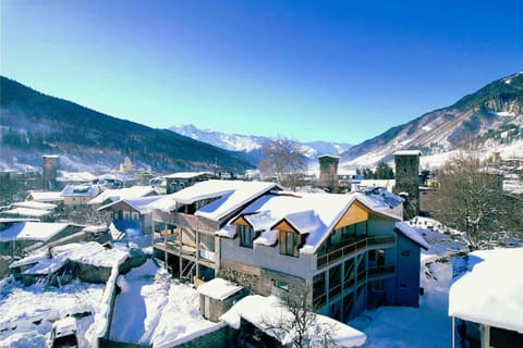 Property building, Nearby landmark, Day, Natural landscape, Winter, Mountain view