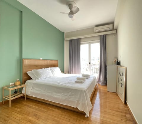 Bed, Photo of the whole room, Bedroom, towels, air conditioner