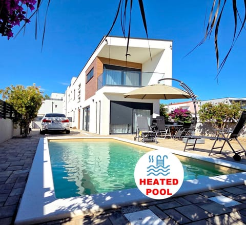 Property building, Text overlay, Swimming pool