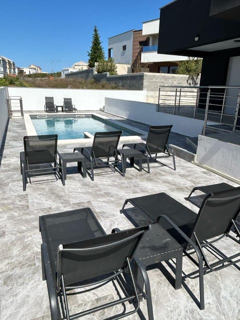 Patio, Day, Swimming pool, sunbed