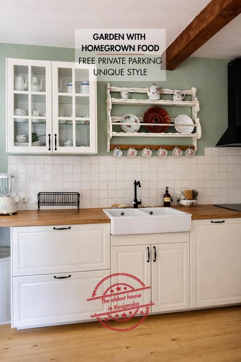 Property logo or sign, Kitchen or kitchenette, Text overlay, stove