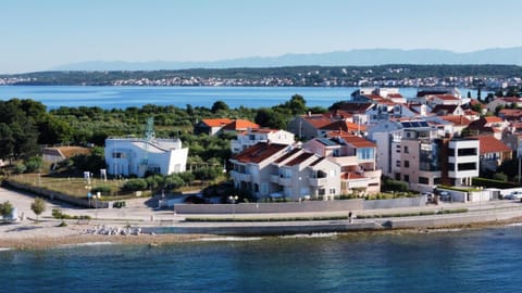 Property building, Natural landscape, Beach, City view, Sea view