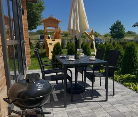 MOJA DEBINA LUX 1, domek z pokojem dziennym, jedną sypialnią i antresolą, blisko plaży House in Pomeranian Voivodeship