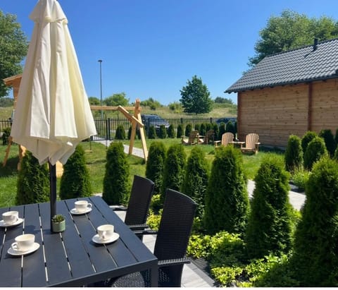 MOJA DEBINA LUX 1, domek z pokojem dziennym, jedną sypialnią i antresolą, blisko plaży House in Pomeranian Voivodeship