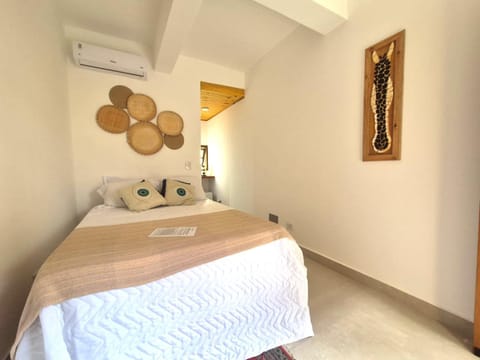 Bed, Photo of the whole room, Bedroom, towels, air conditioner