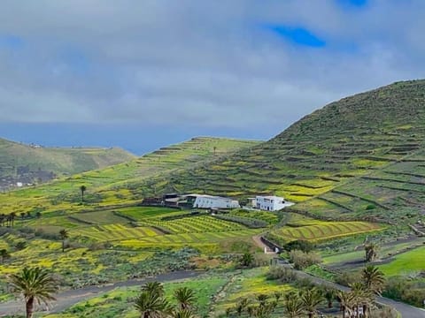 Property building, Nearby landmark, Spring, Off site, Day, Natural landscape, Bird's eye view, Mountain view
