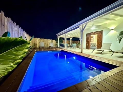Patio, Night, Pool view, Swimming pool, sunbed