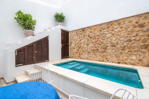 Property building, Living room, Swimming pool