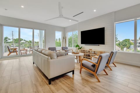 Keys Casa - Elegant Waterfront Retreat, Sleeps 16, Elevator, Private Dock, Putt-Putt House in Key Largo