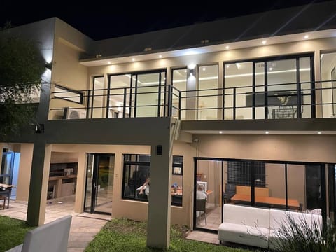 Property building, Patio, Night, View (from property/room), Balcony/Terrace, Living room, Seating area