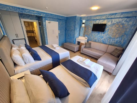 Communal lounge/ TV room, Bed, Photo of the whole room, Seating area